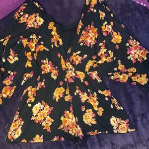 Floral print romper. Comes with an under shirt.
